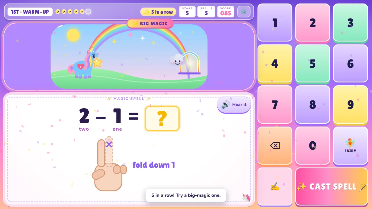Unicorn Meadow at kindergarten level: 2 minus 1 shown as a hand with one finger folding down and the words two and one under the numbers, a Hear it button, a pastel number pad with a Fairy help key